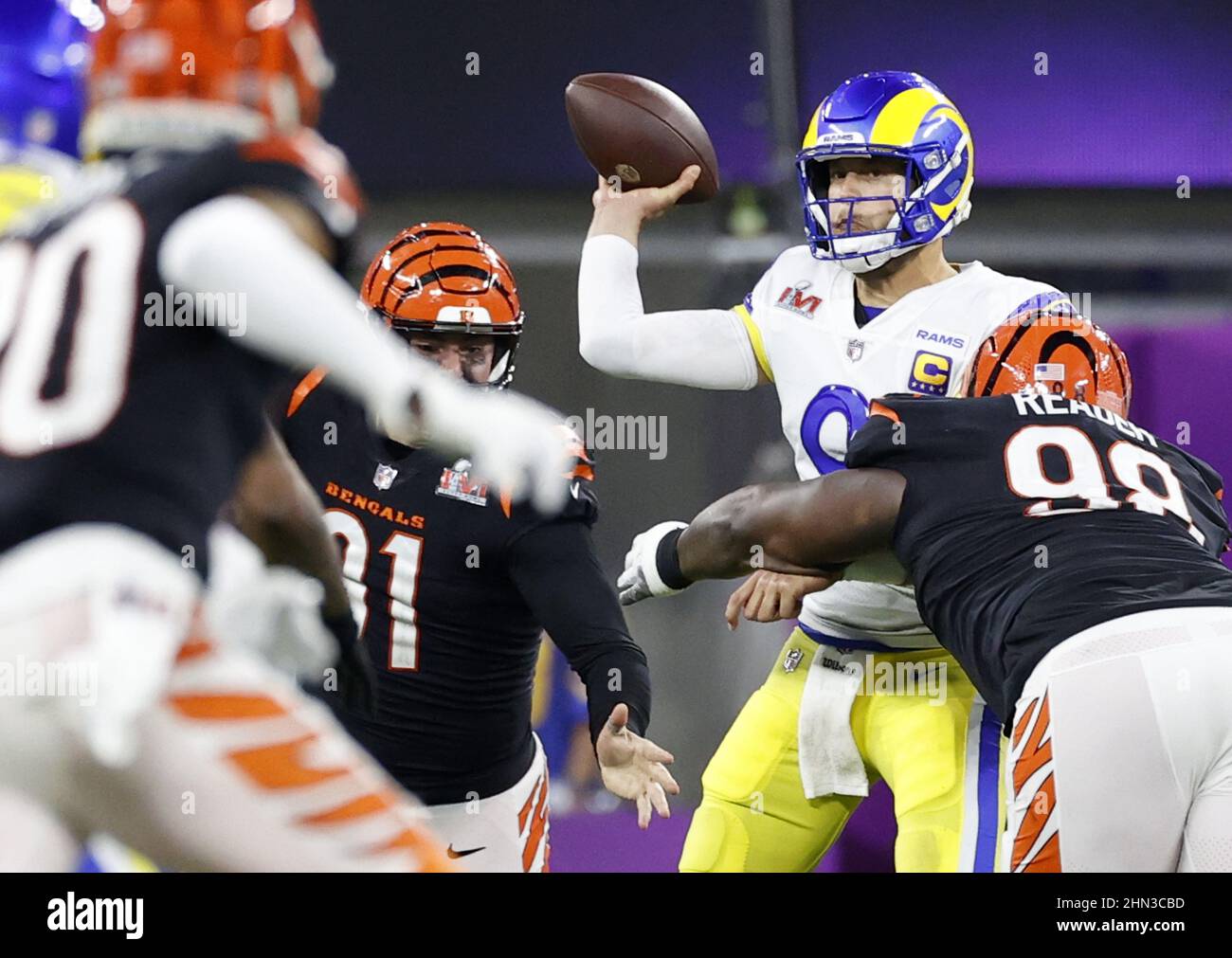 Los Angeles, United States. 13th Feb, 2022. Los Angeles Rams quarterback Matthew Stafford (9) throws a pass while under pressure by Cincinnati Bengals nose tackle D.J. Reader (98) in the third quarter of Super Bowl LVI at SoFi Stadium in Los Angeles on Sunday, February 13, 2022. Photo by John Angelillo/UPI Credit: UPI/Alamy Live News Stock Photo