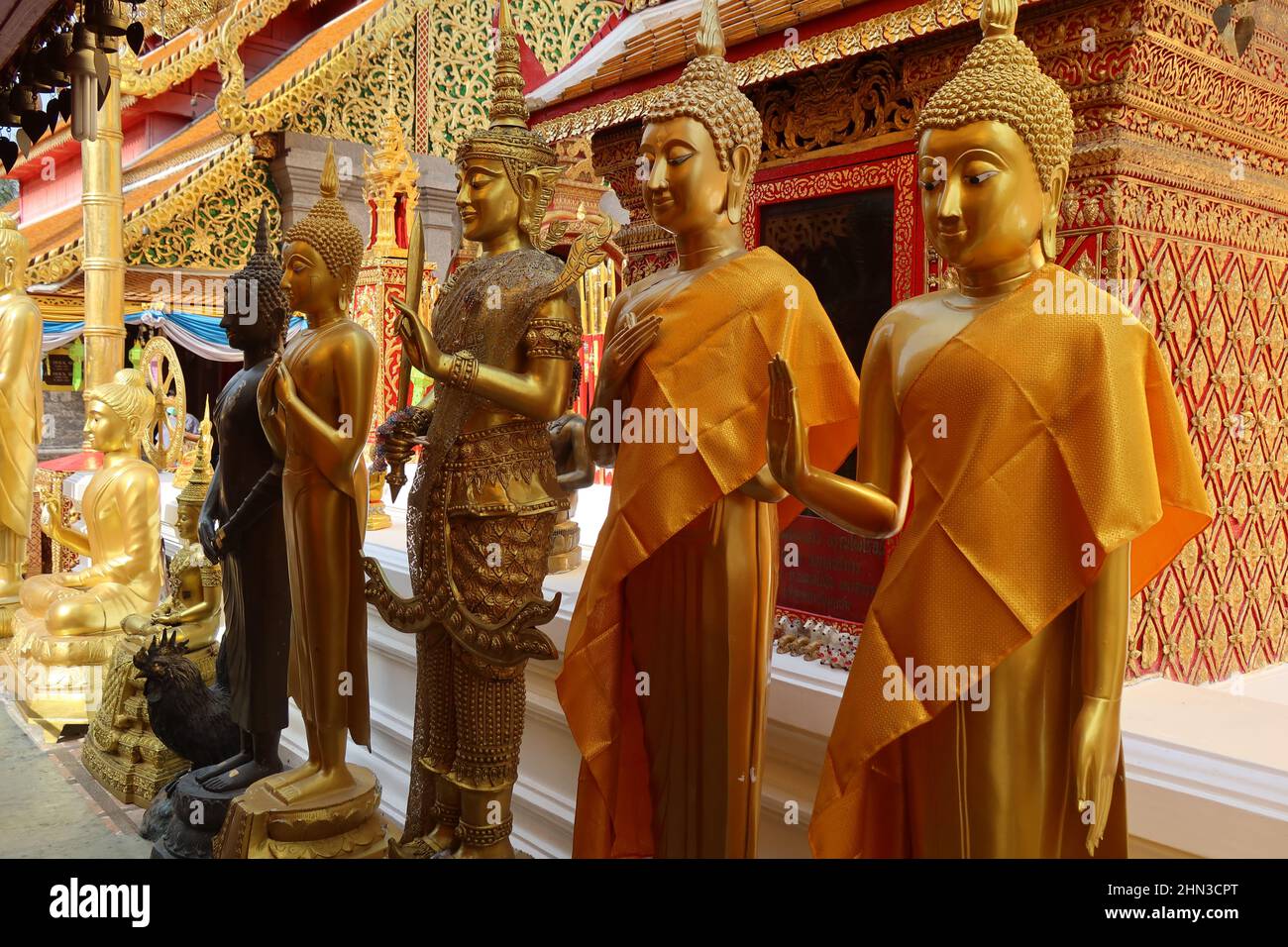 Gold Buddha statues in a row, Wat Phra That, Doi Suthep temple, Chiang Mai, Thailand Stock Photo