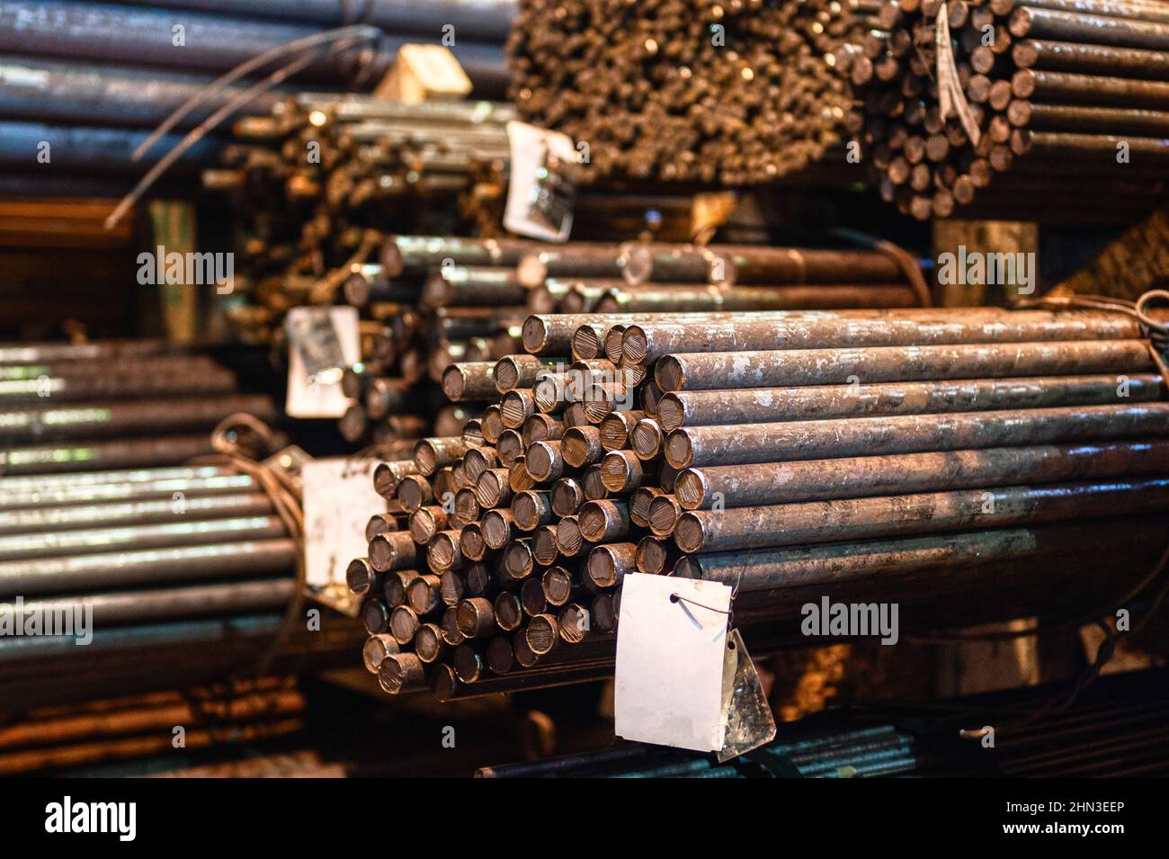 A bundle of round metal bars, steel mill products Stock Photo Alamy