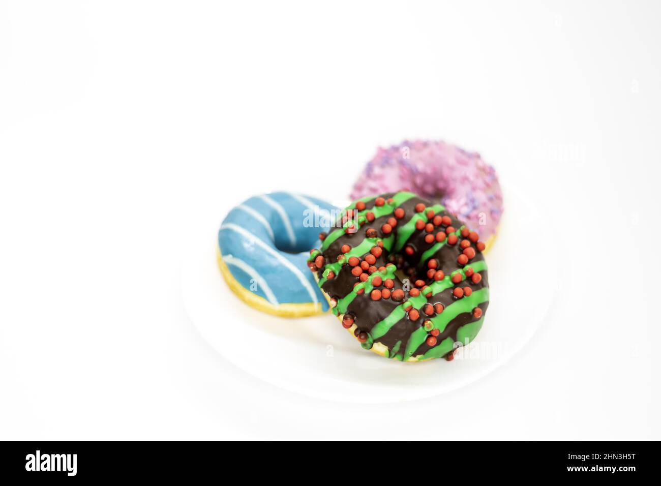 Delicious donuts isolated on a white background Stock Photo - Alamy