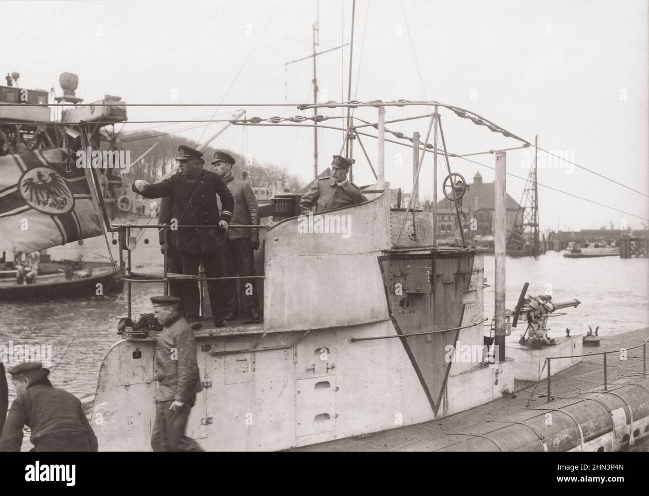 Prince Henry of Prussia on a returning submarine in a home harbor. At Kiel, April 1917 Stock Photo