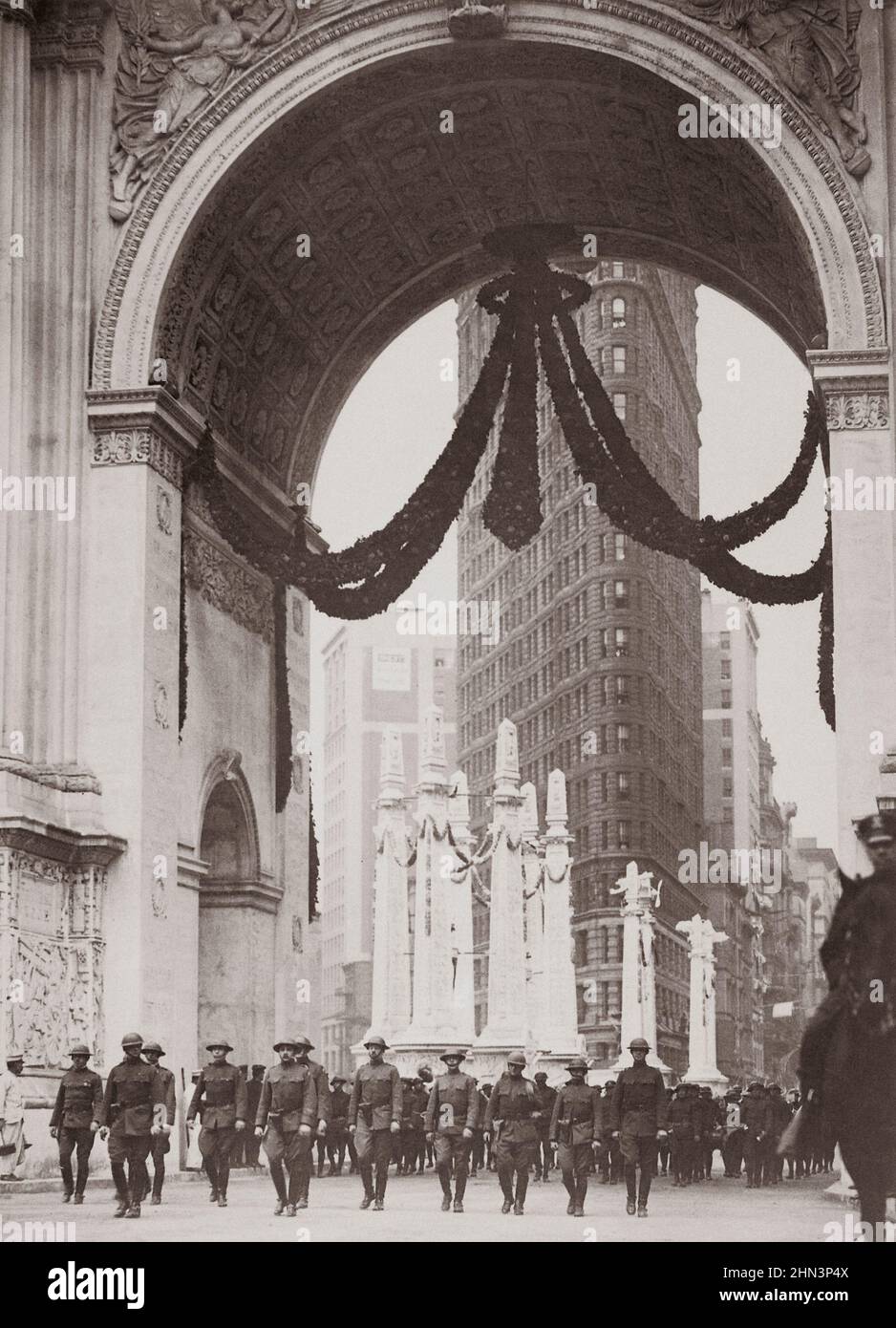 Vintage photo of colonel Donovan and staff of 165th Infantry, passing under the Victory Arch, New York City. 1919 Stock Photo