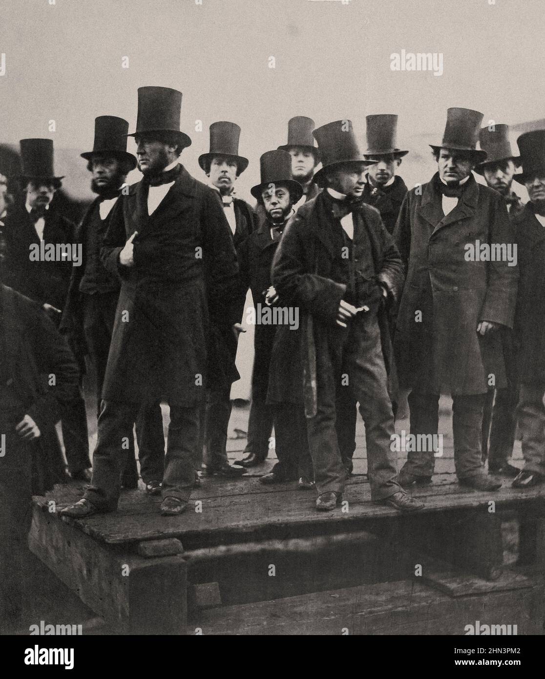 Engineer Isambard Kingdom Brunel (front row, center-right) and others observe the Great Eastern launch attempt in Blackwall, London, in November of 18 Stock Photo