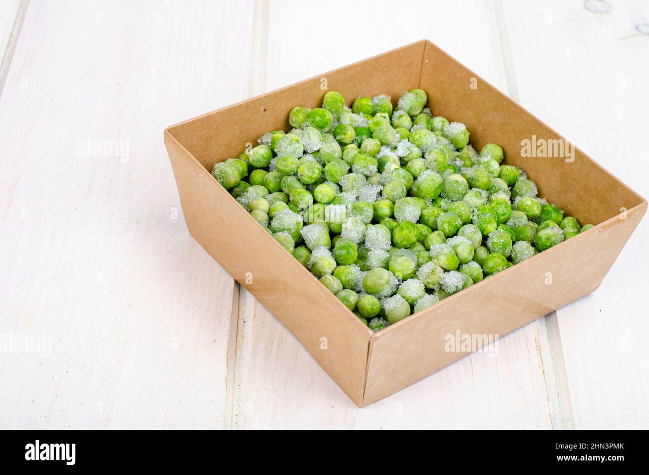 Frozen green peas, preservation of vitamins and vegetables. Studio