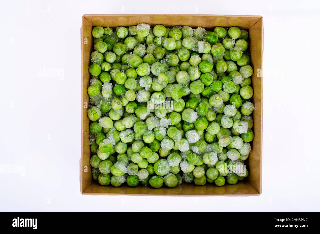 Frozen green peas, preservation of vitamins and vegetables. Studio