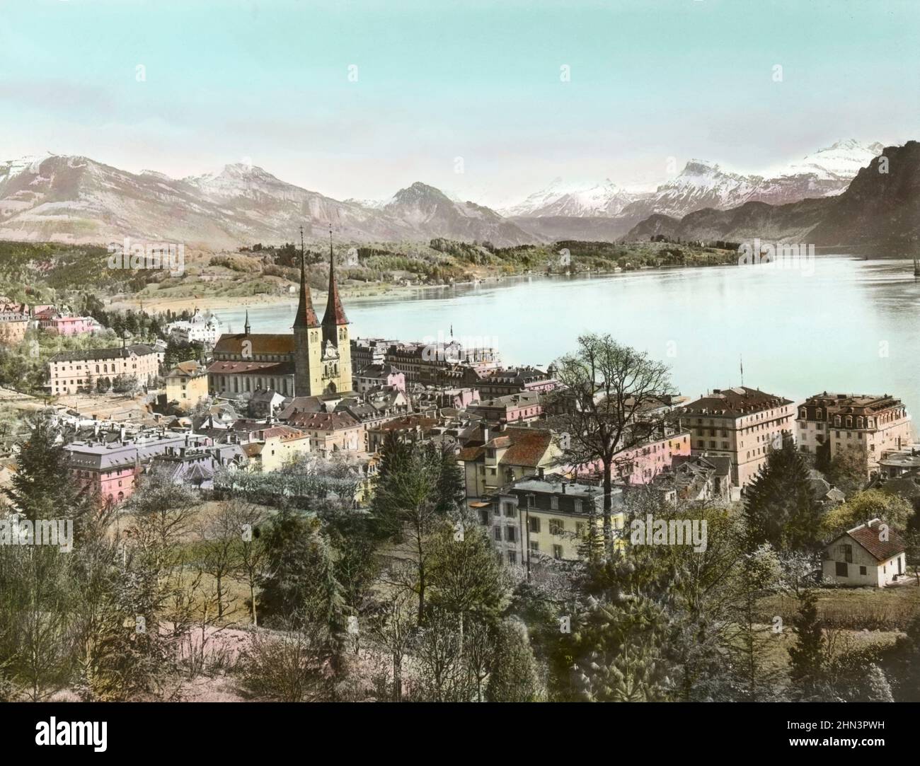 Vintage color photo of of Lucerne to the Alps. 1920s Lucerne is a city in central Switzerland, in the German-speaking portion of the country. Stock Photo
