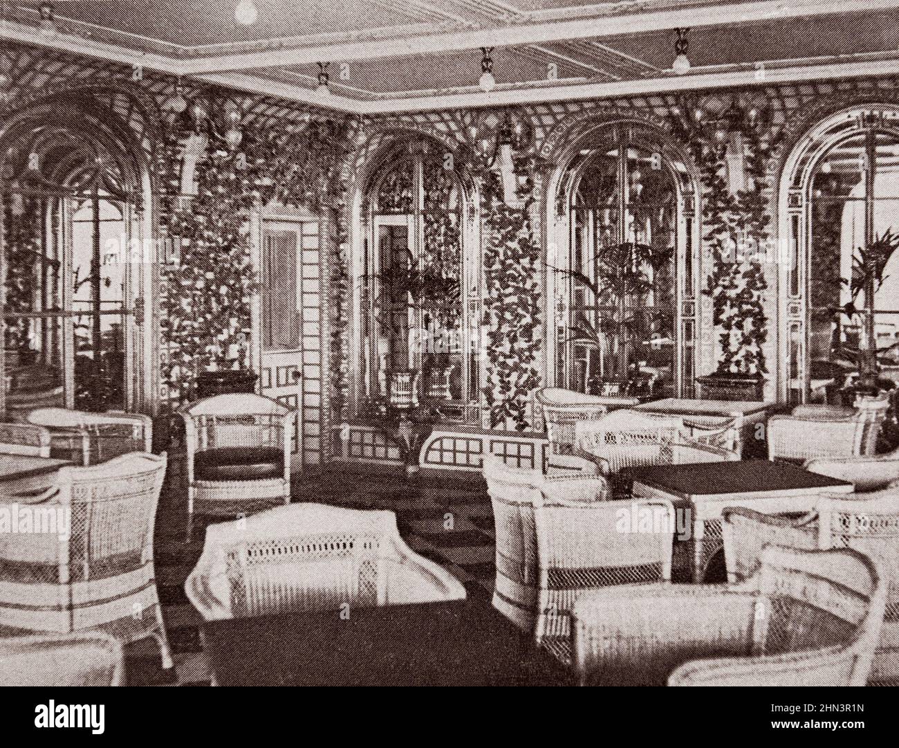 Luxury and comfort on board interior of the 'Titanic' liner: The Verandah cafe for five-o-clock. 1912 Stock Photo