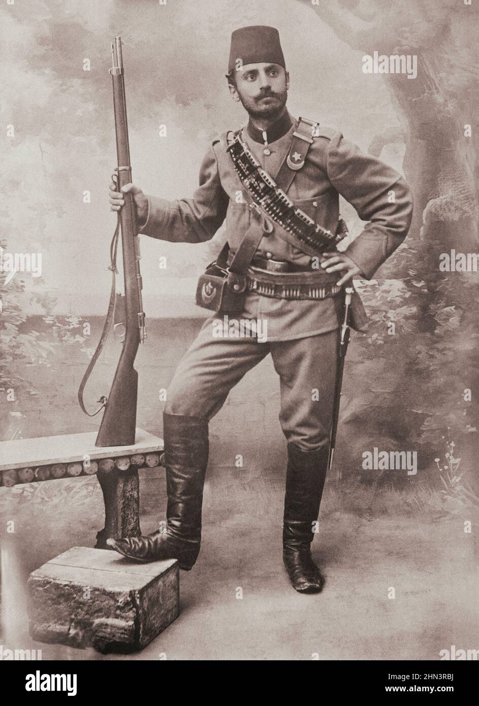 Vintage photo of Turkish soldier from Salonican front, with gun and bayonet. Ottoman empire. 1915-1917 Stock Photo