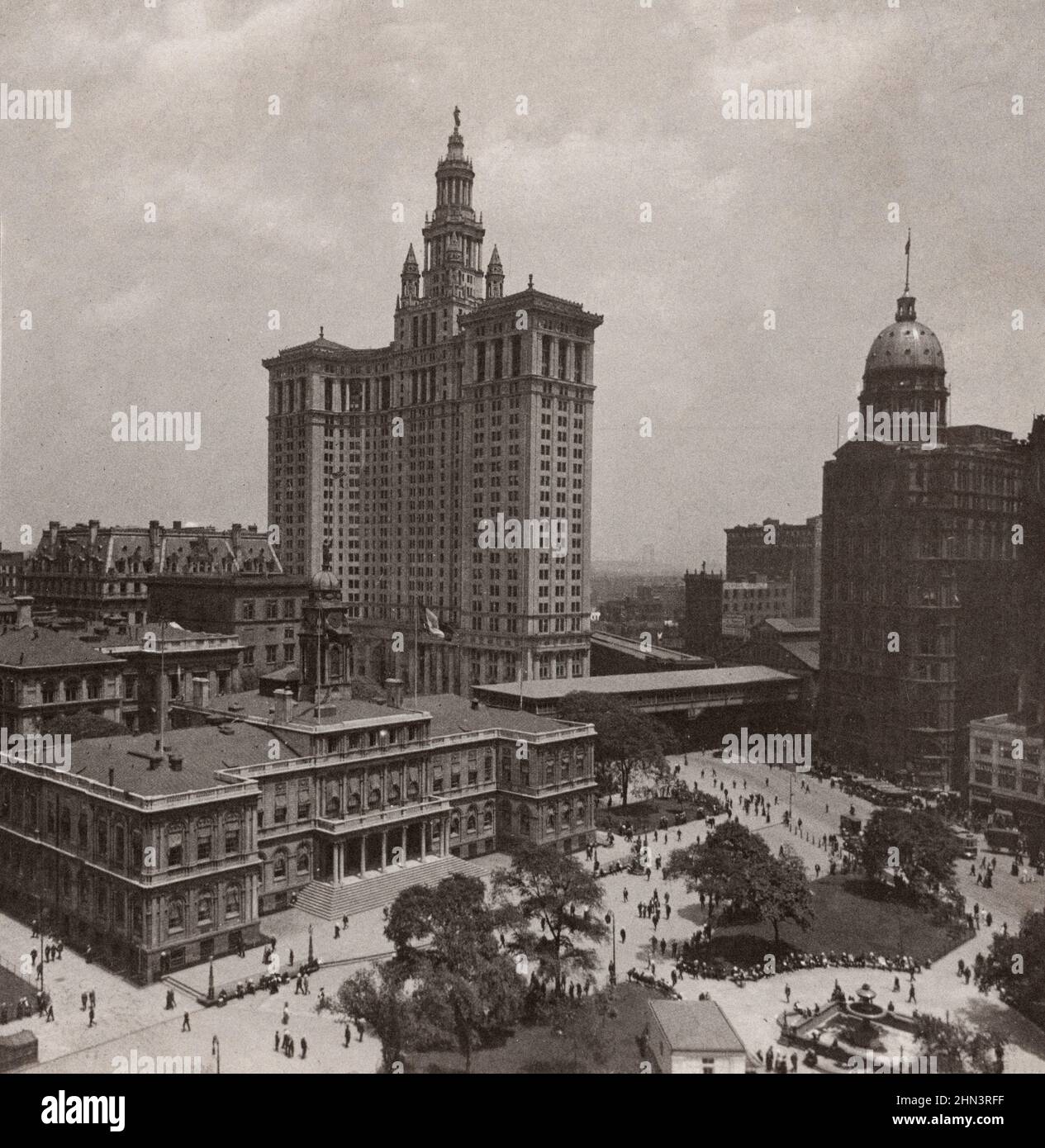 Vintag photo of old and new city halls and World Building, from City Hall Park, New York City, USA. 1910s Stock Photo