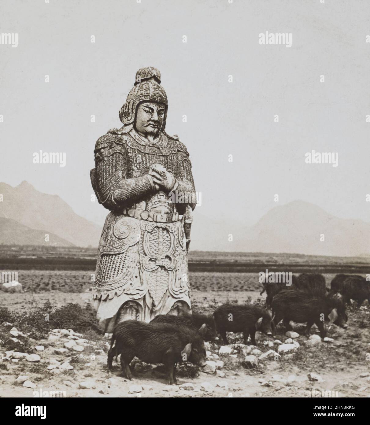 Vintage photo of ancient Chinese sculpture of a marble soldier. The Ming Tombs. North China. 1902 Stock Photo