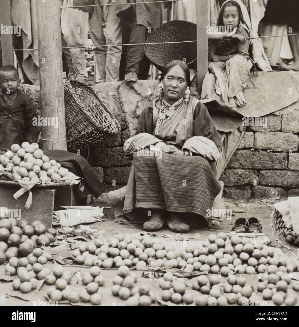 Vintage photo of Guava seller in Darjeeling. British India. 1900s Stock Photo