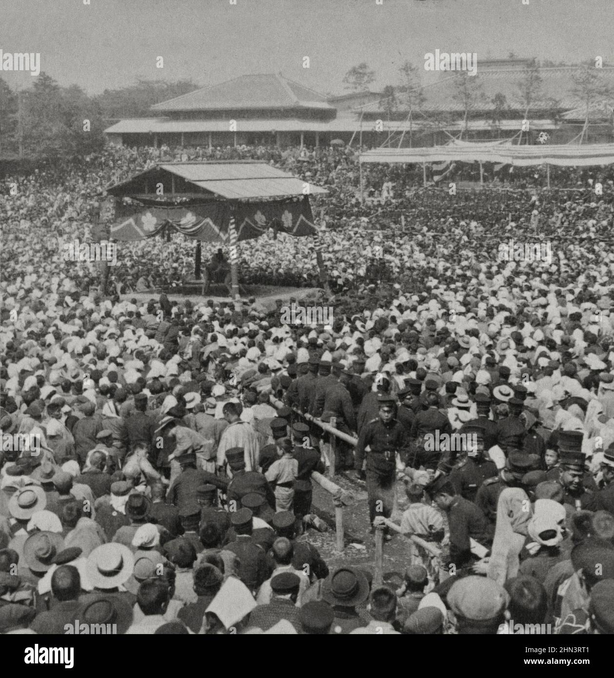Vintage photo of a wrestling match, Japan's favorite sport, watched by 20,000 spectators. Tokyo, Japan. 1905 Stock Photo