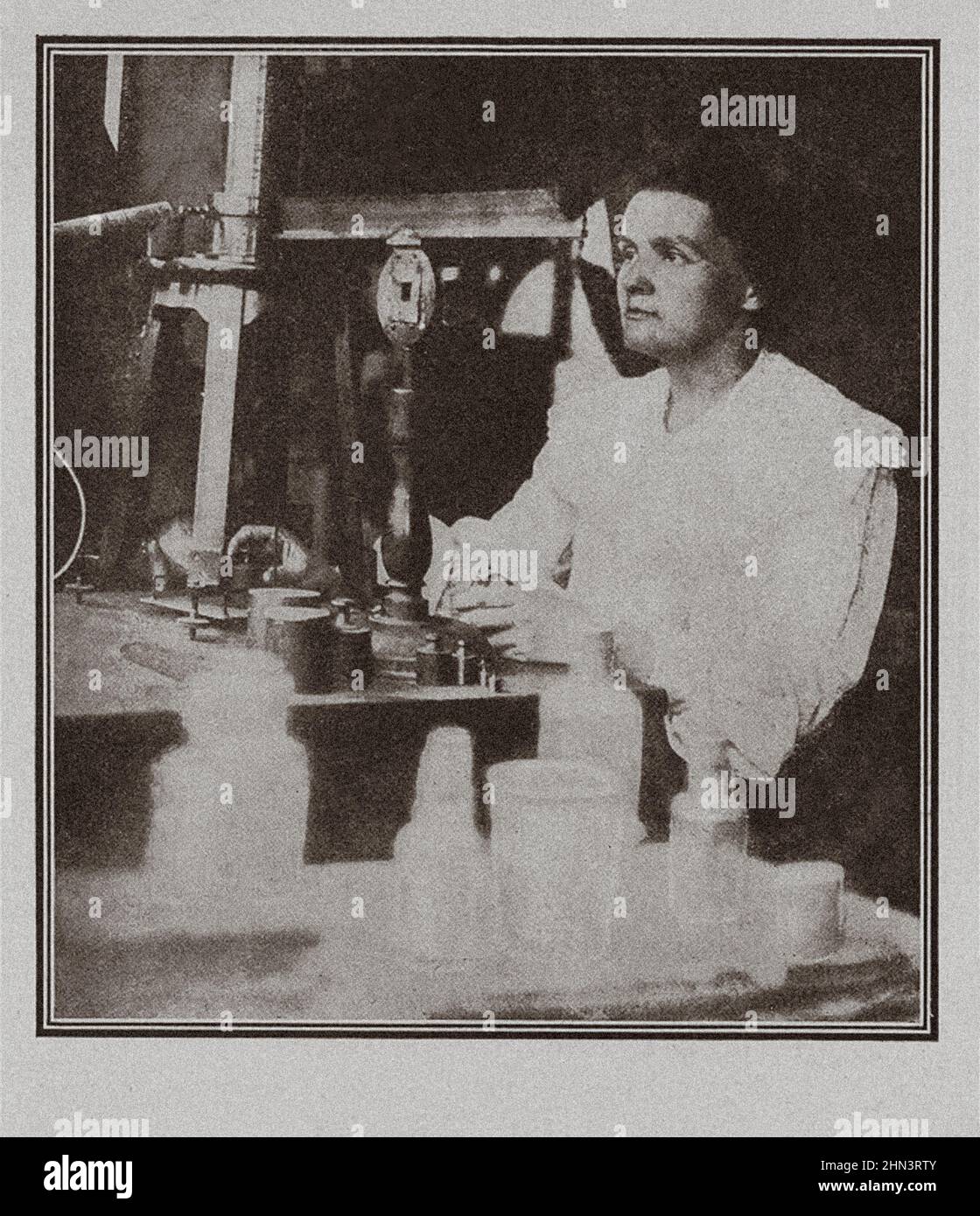 Vintage photo of madame Marie Curie in her laboratory.  Marie Salomea Skłodowska Curie (born Maria Salomea Skłodowska, 1867–1934) was a Polish and nat Stock Photo