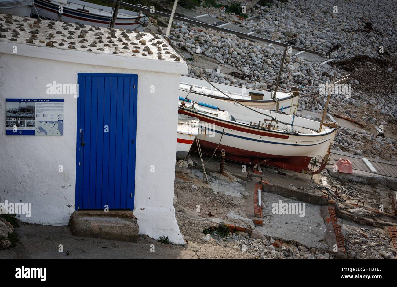 Traditional fishing boats in the Catalan fishing village of L'Escala Stock Photo