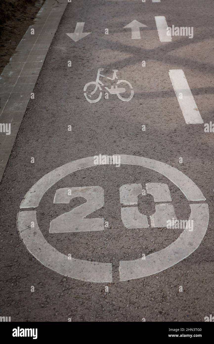 Cycle lane in Catalonia, Spain with speed restriction written in kilometres per hour Stock Photo