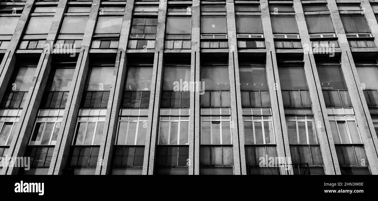 Brutalist style tower block against a cloudless sky Stock Photo - Alamy