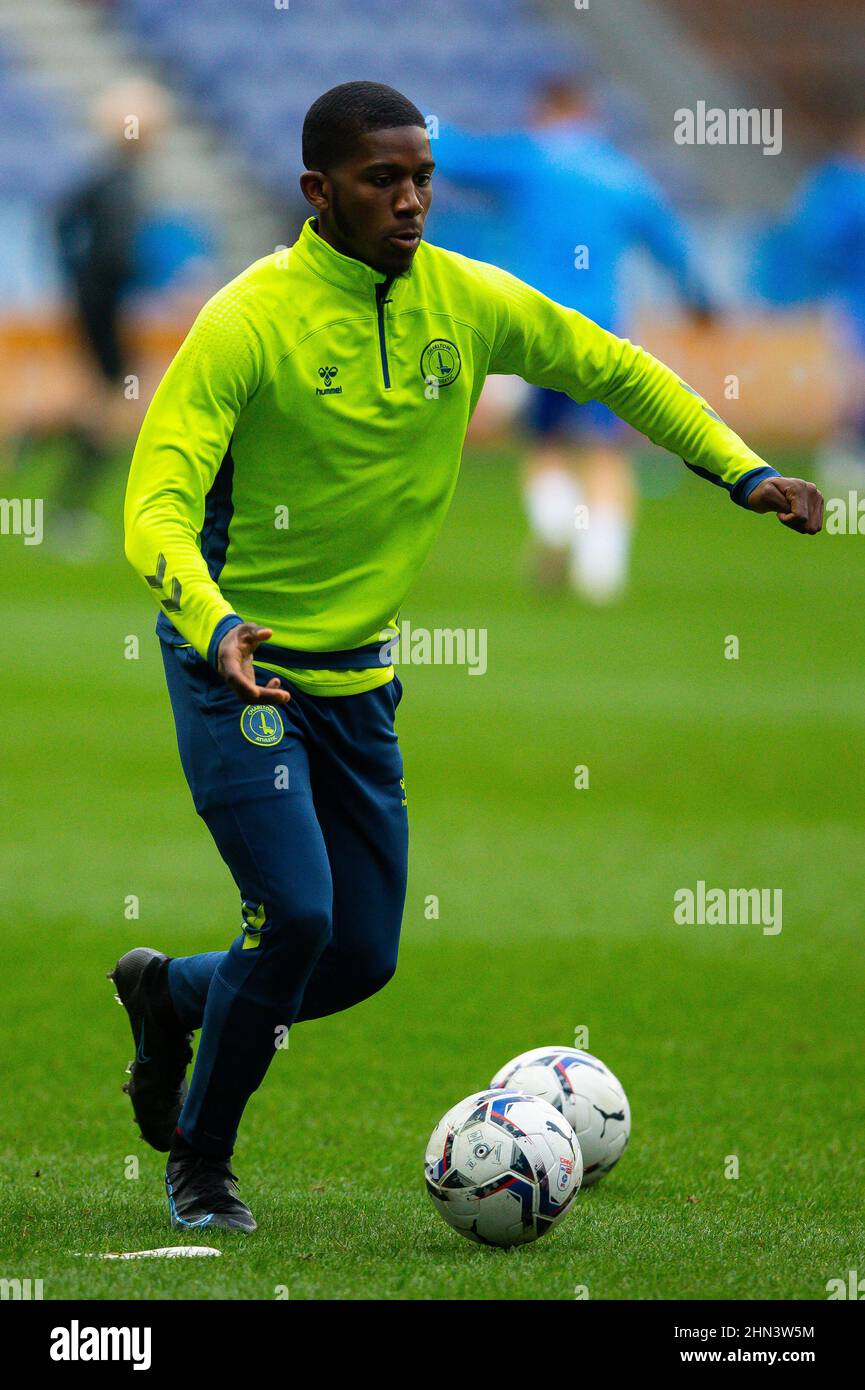 Charlton Athletic’s Daniel Kanu warms up on the pitch ahead of the Sky Bet League One match at the DW Stadium, Wigan. Picture date: Saturday February 12, 2022. Stock Photo