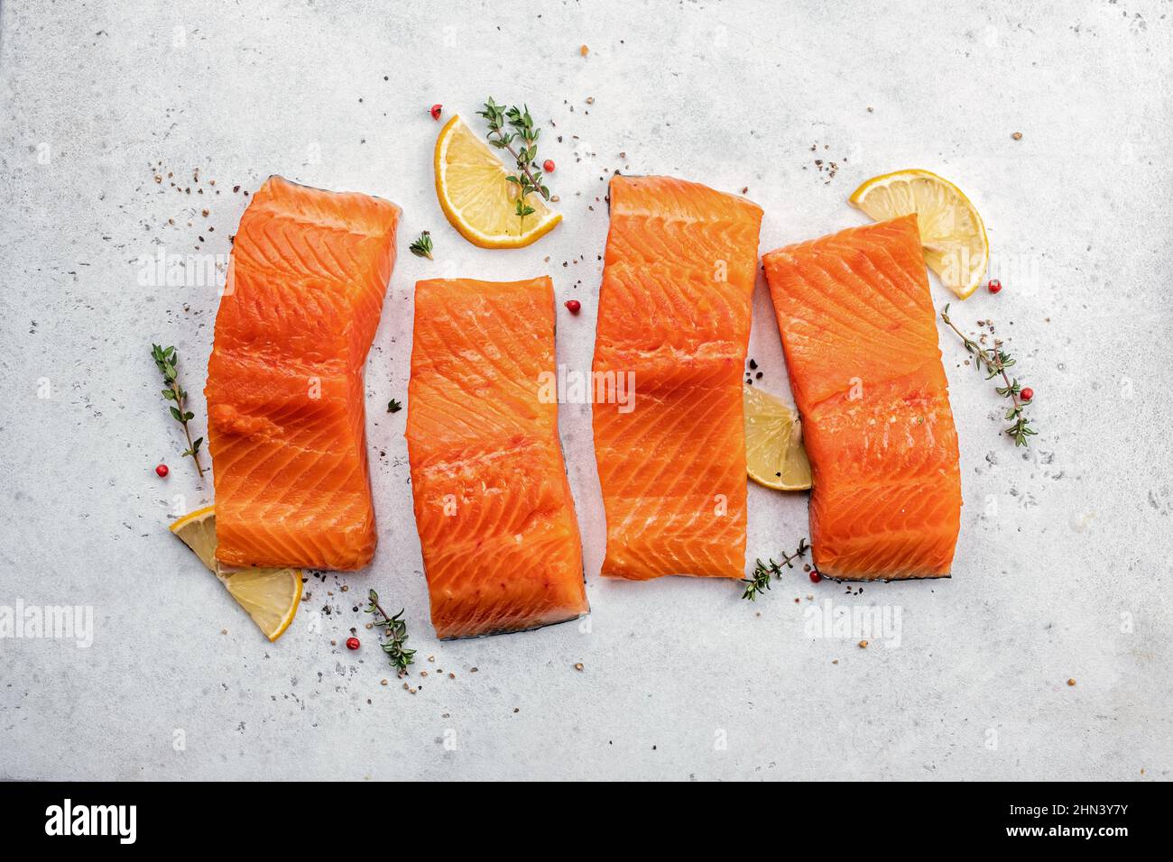 Salmon. Fresh raw salmon fish fillet with cooking ingredients, herbs ...