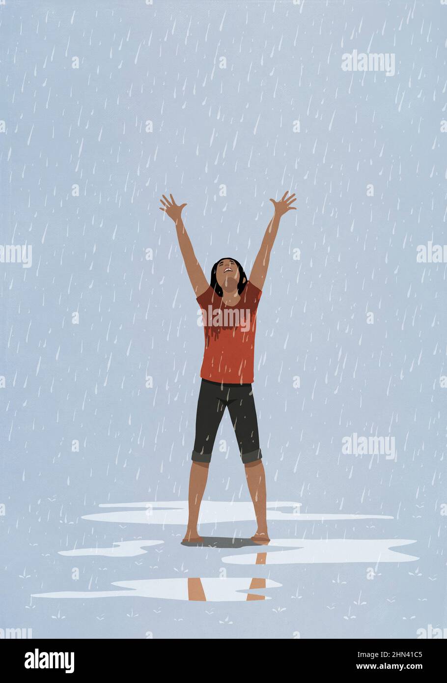 Barefoot, exhilarated woman with arms raised in rain Stock Photo - Alamy