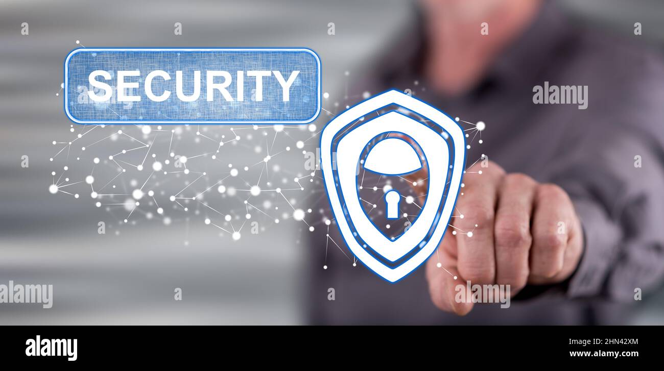 Man touching a cyber security concept on a touch screen with his finger ...