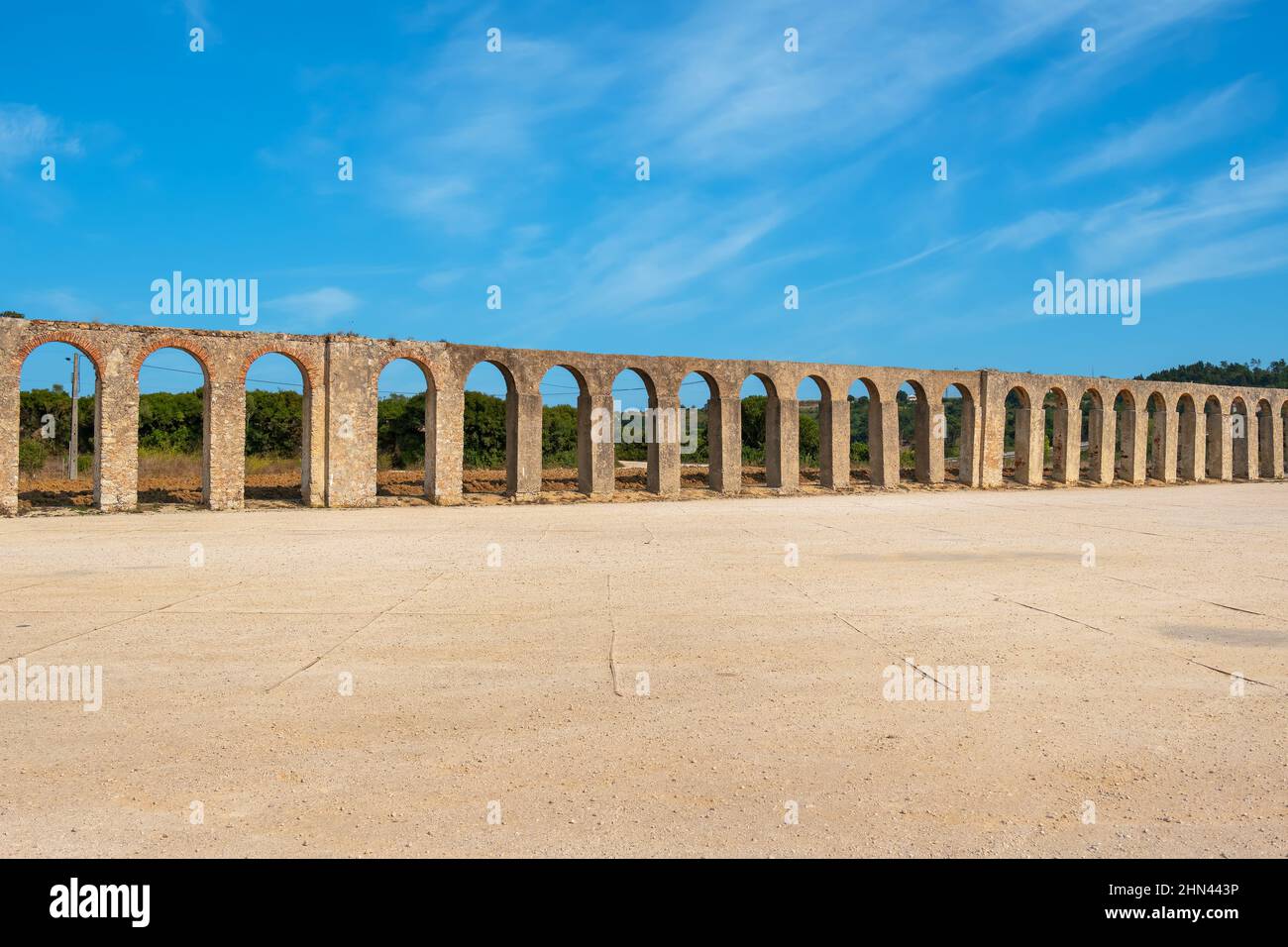 View to 16th century Aqueduct (Aqueduto da Usseira) in Obidos. Portugal Stock Photo