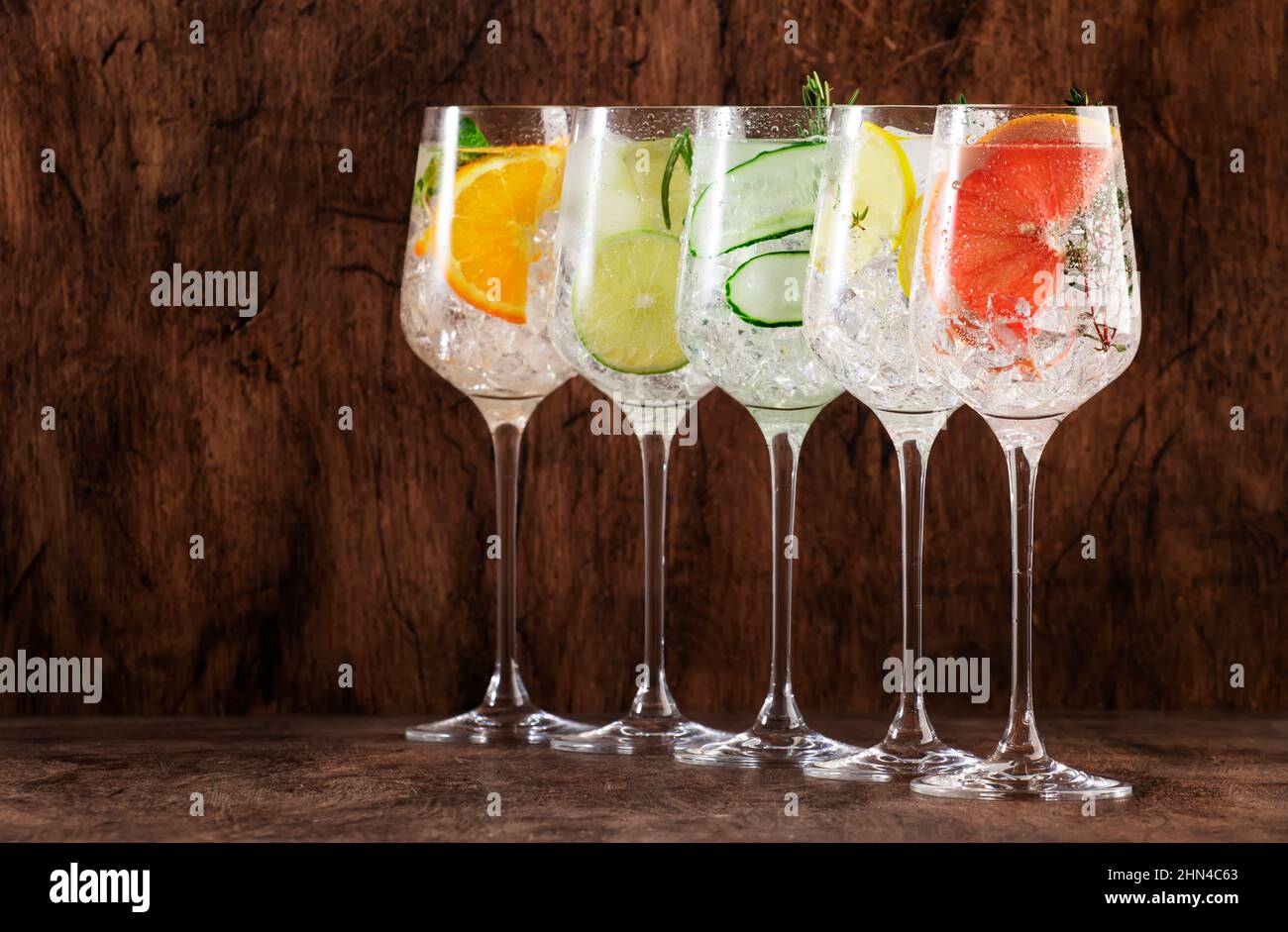 Gin and tonic cocktails set. Alcoholic drinks with lime, lemon