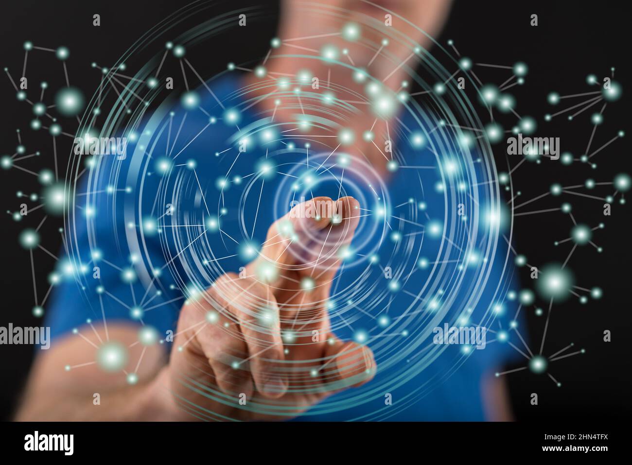 Man touching a virtual network on a touch screen with his finger Stock ...