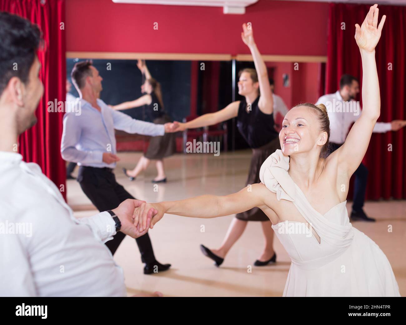 People practicing lindy hop movements Stock Photo