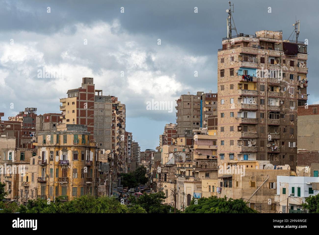 An apartment building in Africa in a poor neighborhood. Stock Photo