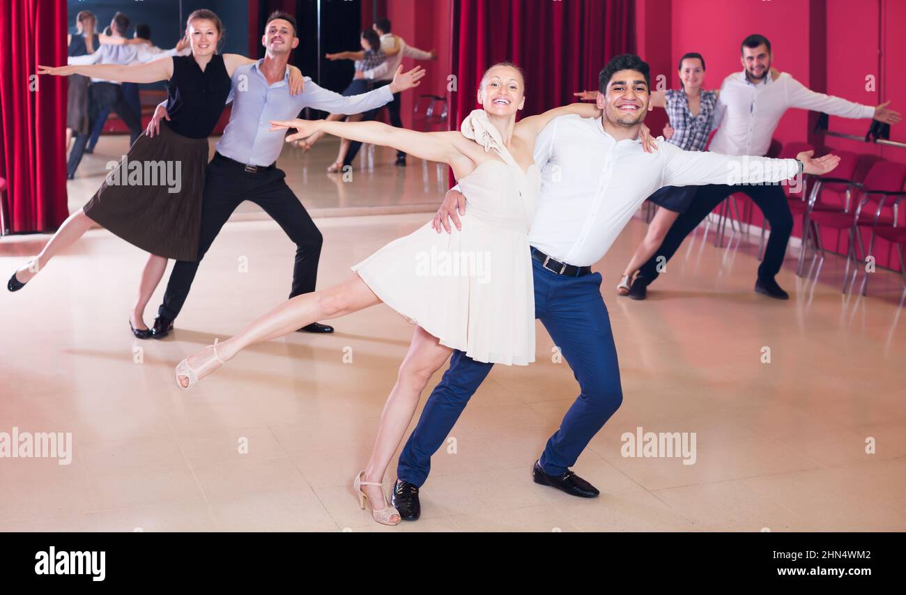 Glad people practicing passionate samba Stock Photo