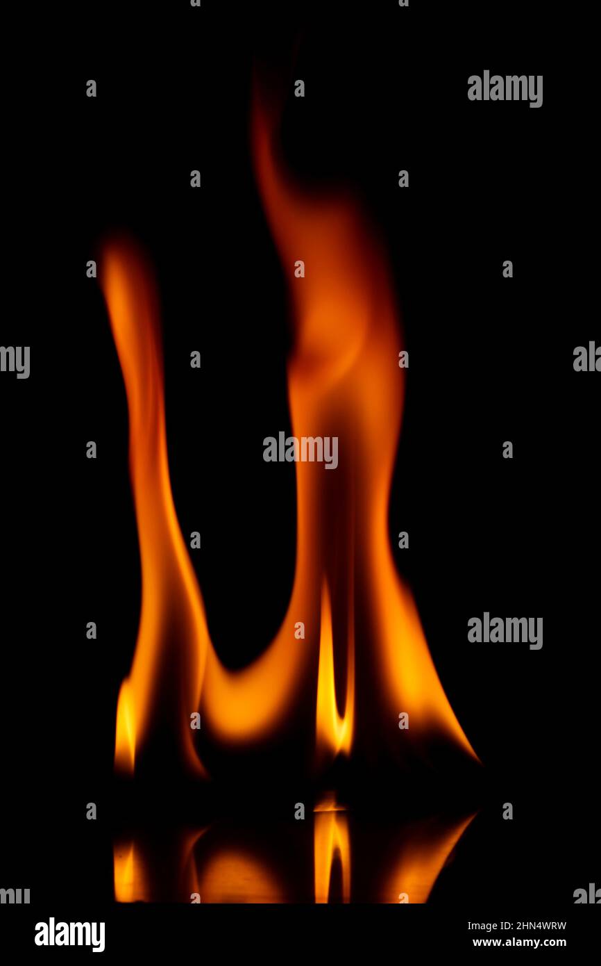 Fire flames isolated on a black background Stock Photo - Alamy