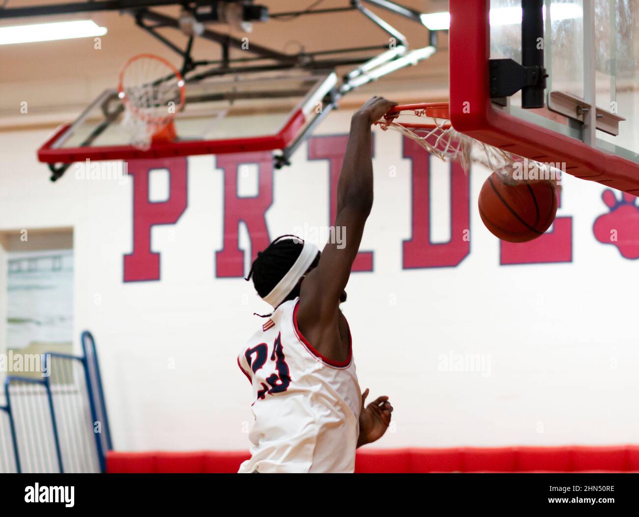 High school basketball player dunking hires stock photography and
