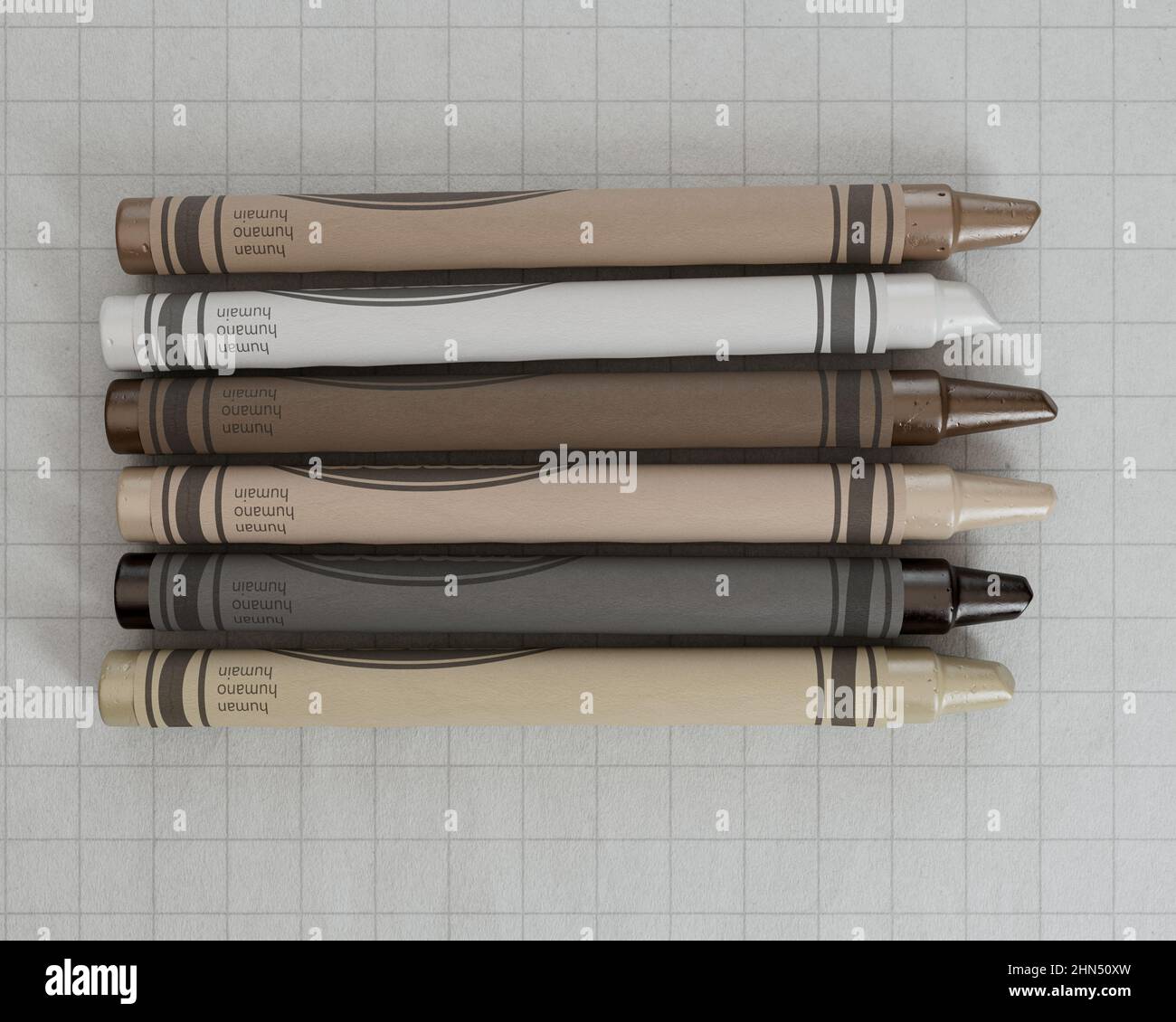 A concept showing childrens wax crayons in various color shades of skin tones yet all the same