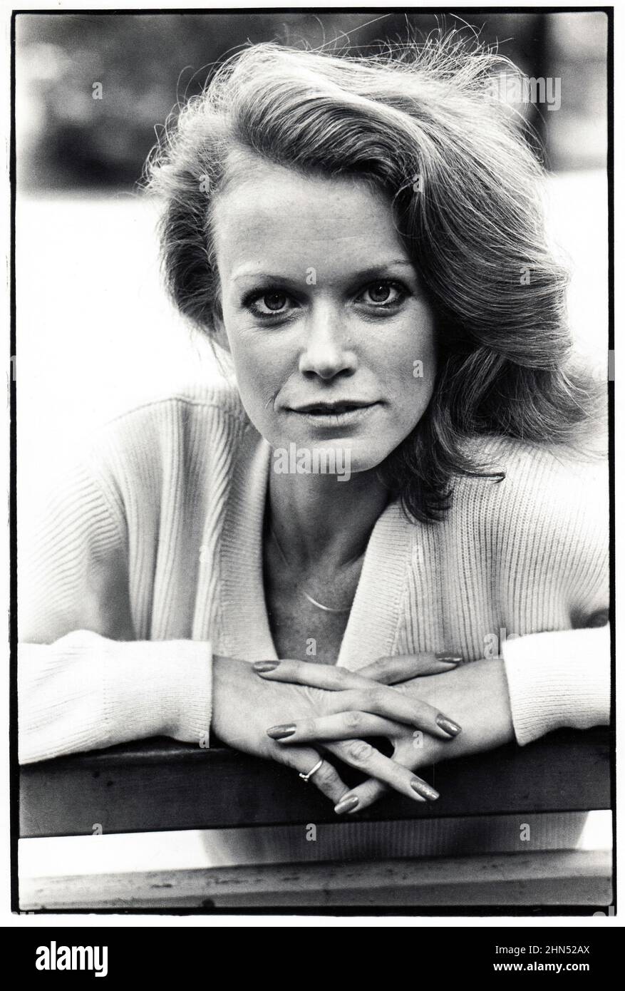 A posed portrait of model and Charlie's Angels actress, Shelley Hack. Seated on a bench in Central Park, Manhattan, New York City, Stock Photo