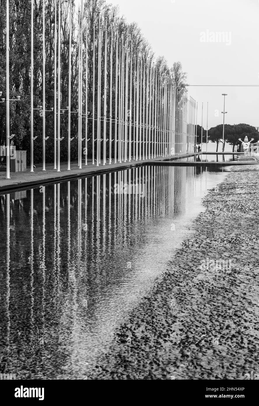 Lisbon, Portugal - 12 28 2018: Modern buildings and an artwork exposition of Fernando Conducto reflecting in a shalow water basin Stock Photo