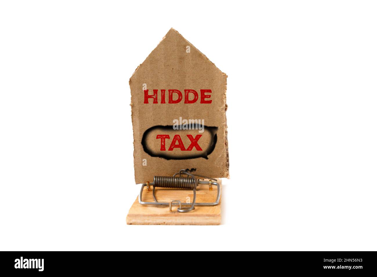 The concept of investment Banks. Mousetrap with a cardboard house, with the inscription HIDDE TAX. Isolate and copy space. Stock Photo