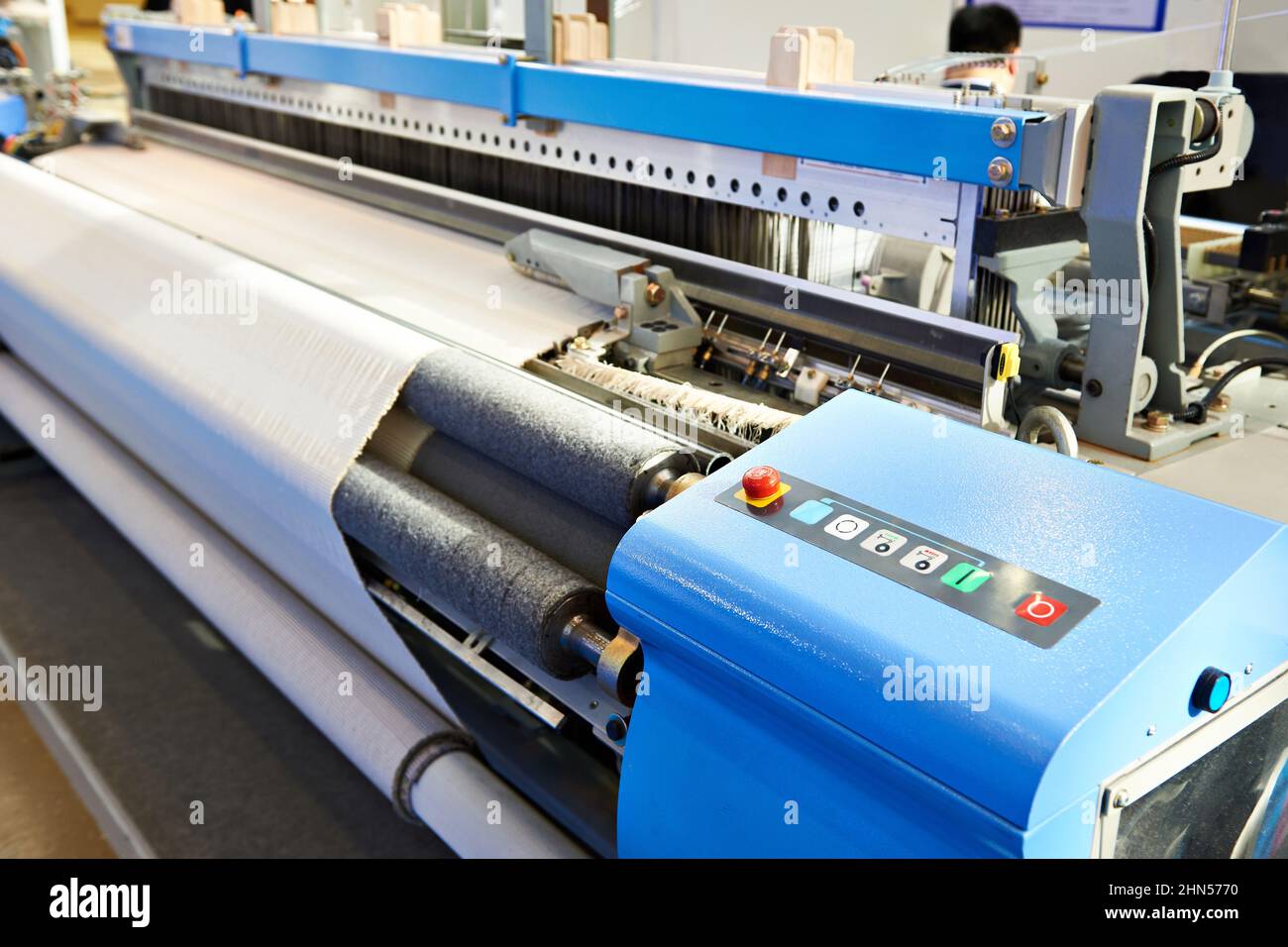 High-speed pneumatic weaving machine on plant Stock Photo