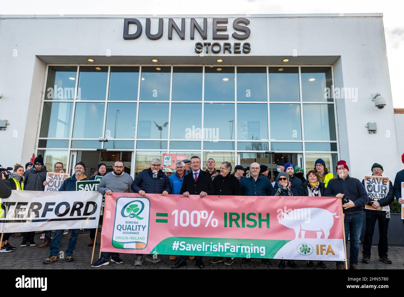 Bishopstown, Cork, Ireland. 14th Feb, 2022. IFA is holding simultaneous protests outside Dunnes Stores in Cork and Monaghan today to highlight the failure of the retail sector to give price increases to suppliers to address cost increases at farm level. A large contingent of pig, poultry and horticulture farmers attended the Cork protest, which was also attended by the IFA president, Tim Culinan. Credit: AG News/Alamy Live News Stock Photo