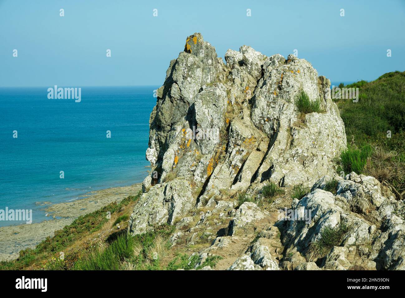 Rock of Sard (or : devil rock), Lude valley in Carolles (Manche, Normandy, France). Stock Photo