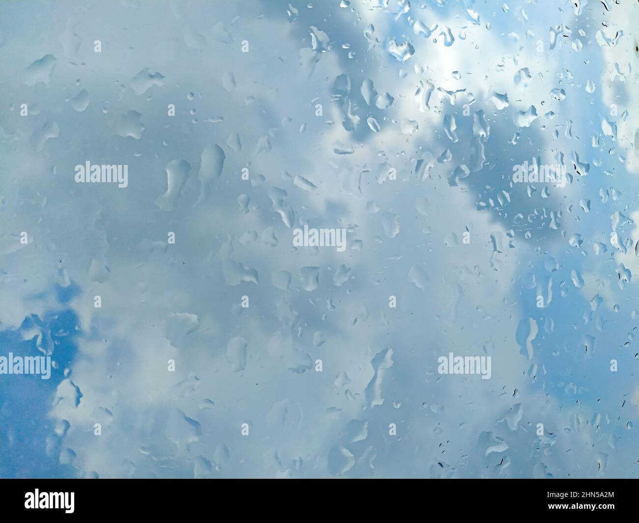 Rain drops on the glass background Stock Photo - Alamy