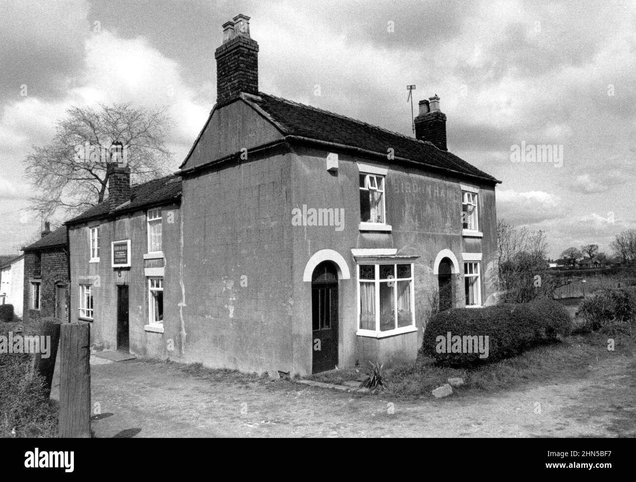 Historic pubs, Canalside Bird in Hand Inn, Scholar Green, Cheshire in 1970s, beside Macclesfield Canal Stock Photo