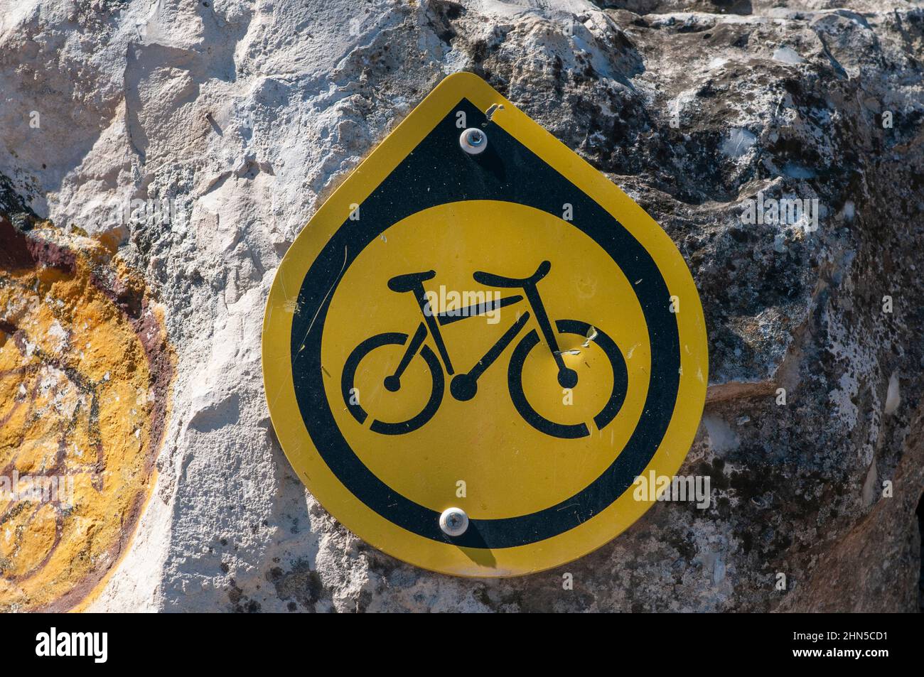 Single track cycling sign pointing in the route's direction. Photographed in the Lower Galilee, Israel Stock Photo
