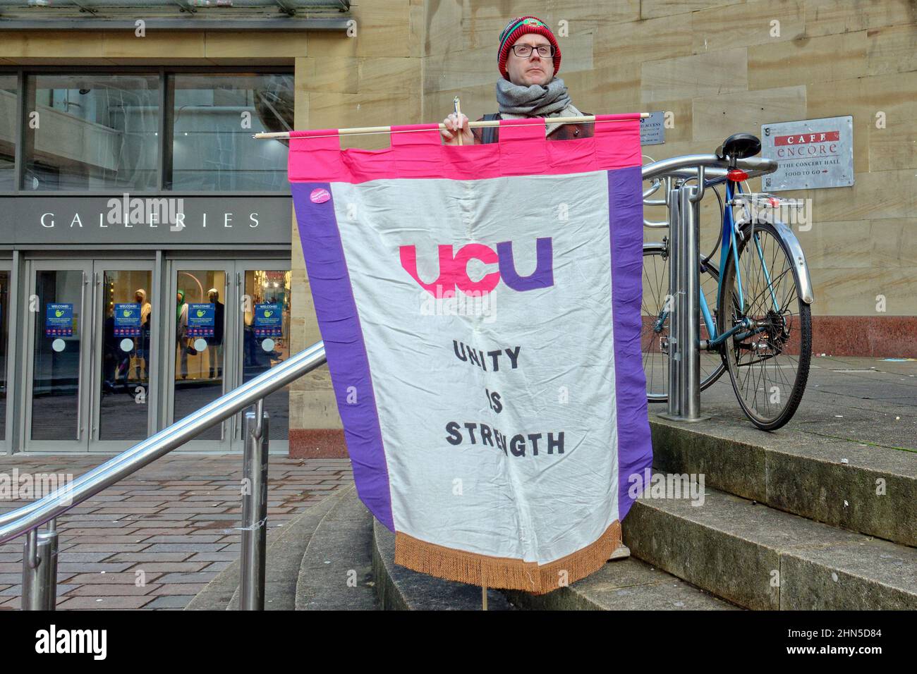 Glasgow, Scotland, UK  14th February, 2022.  University staff rally on the steps of Buchanan galleries today . Credit  Gerard Ferry/Alamy Live News Stock Photo