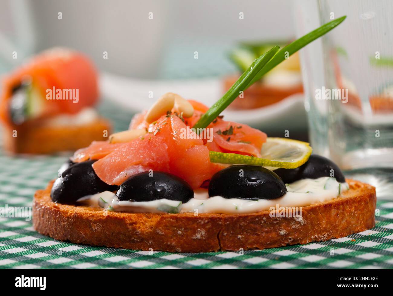 Delicious canape with salmon fillet Stock Photo - Alamy