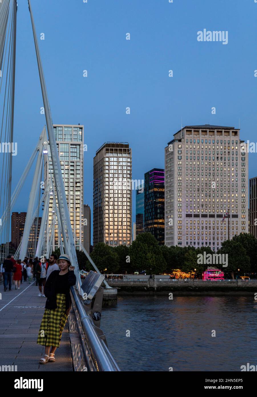 Complex at dusk from Golden Jubilee Bridge. 8-13 Casson Square, London, United Kingdom. Architect: Patel Taylor Architects, 2022. Stock Photo