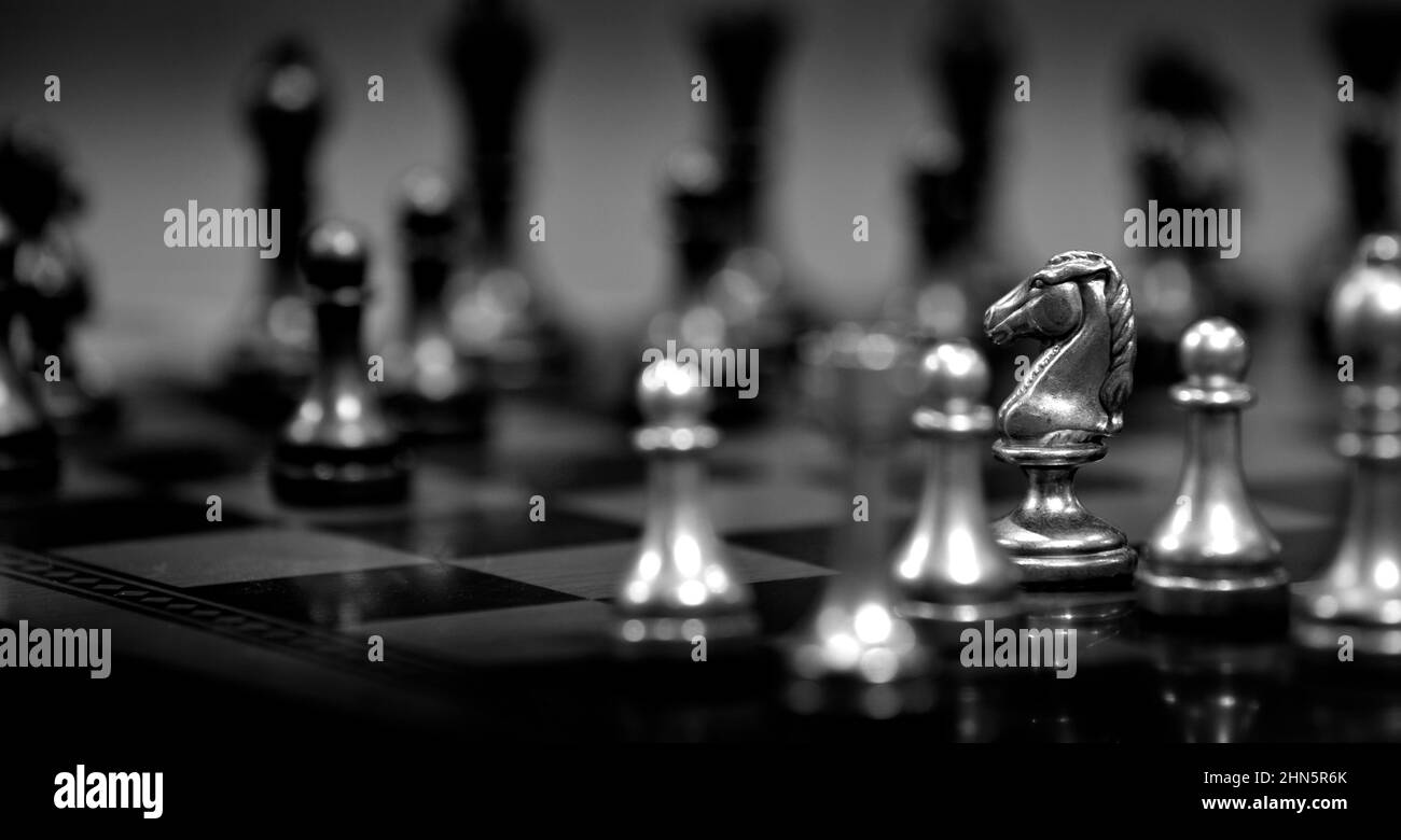 Pieces on chess board for playing game and strategy Stock Photo