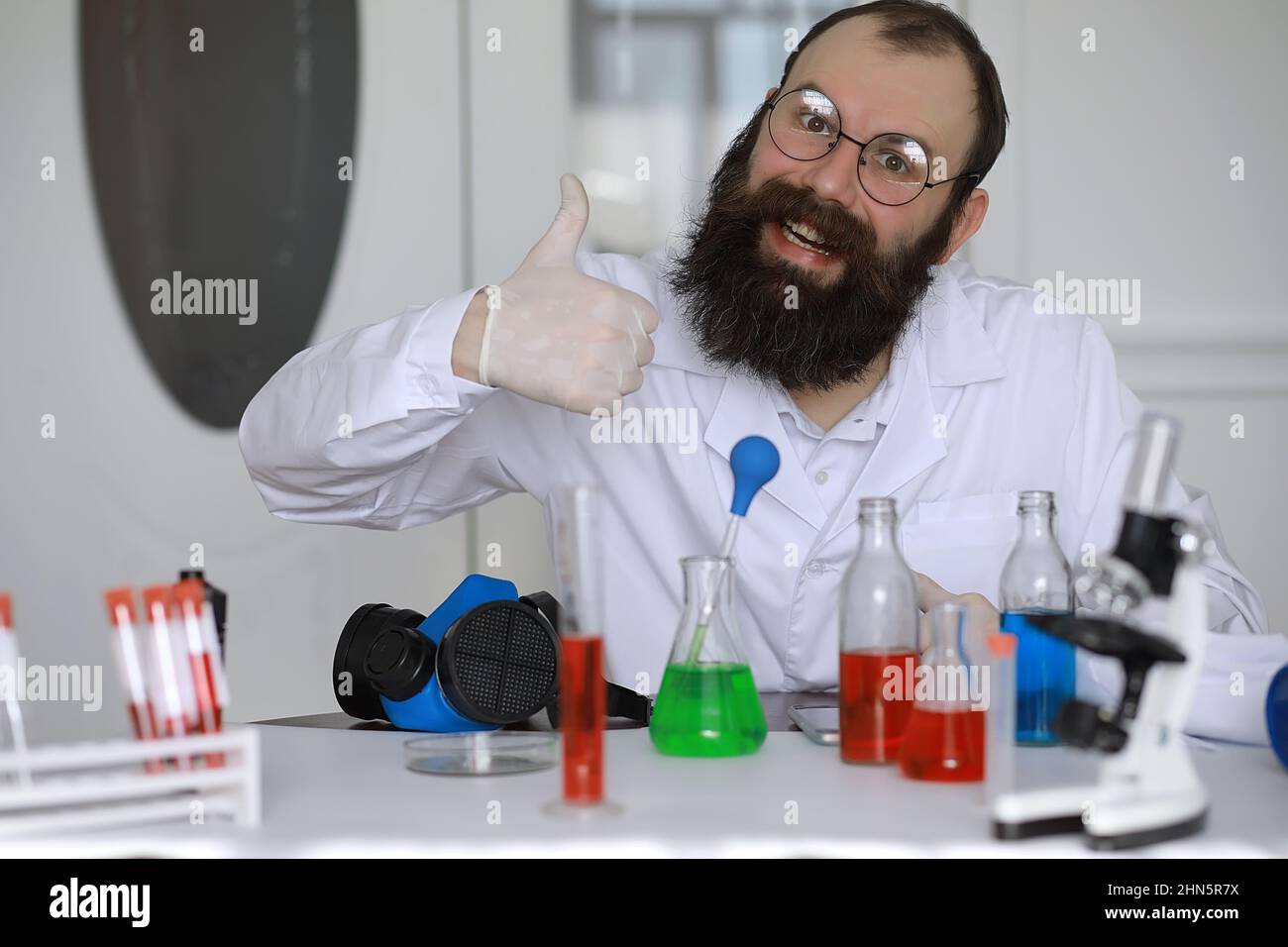 Chemist crazy. A mad scientist conducts experiments in scientific