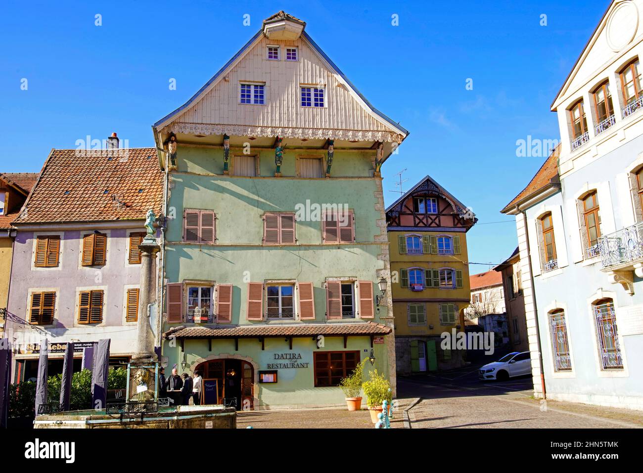 House of the Caryatids (Maison des Caryatids) in Delle old town, Burgundy, Franche-Comté, France. This beautiful building, almost unchanged since the Stock Photo