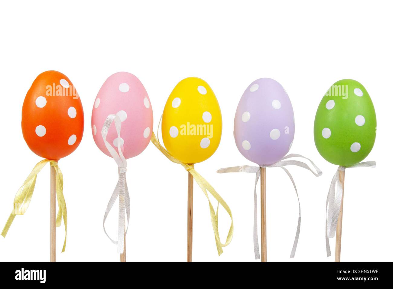 Multicolored easter eggs in dots isolated on the white background Stock Photo