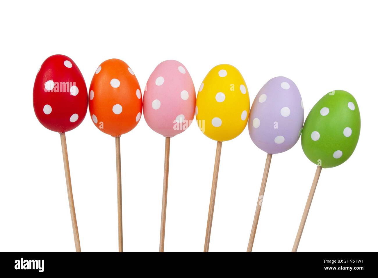 Multicolored easter eggs in dots isolated on the white background Stock Photo